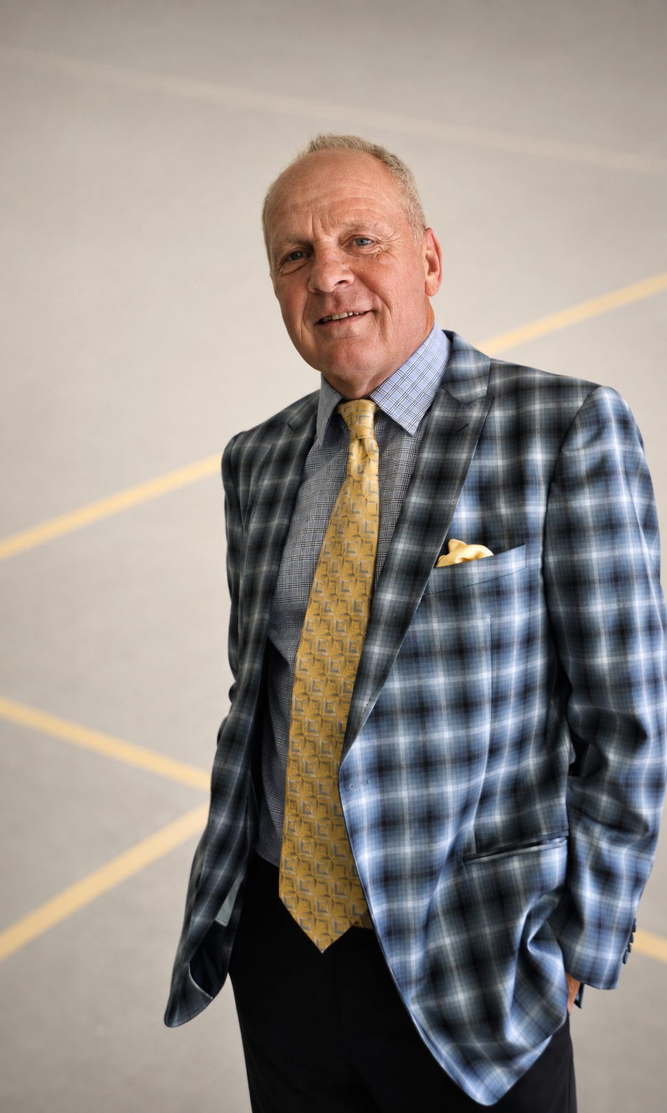 Bob Bogoslowski in a blue checked jacket and yellow tie